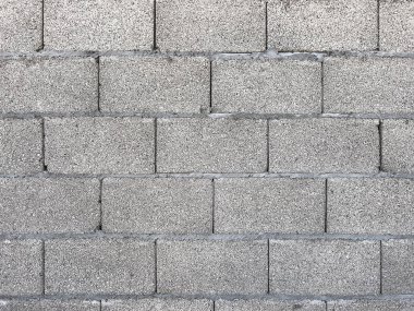 Arka plan ya da inşaat endüstrisi dokusu olarak beton bloklardan yapılmış dış duvar