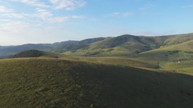 Aerial view of Zlatibor hills landscape in Serbia, beautiful sunrise scenery