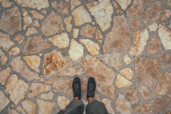 Overhead Shot Male Feet Black Sneakers Standing Stone Flooring Surface — Photo