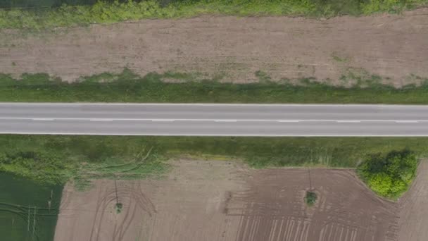 Top View Black Passenger Car Straight Highway Countryside Landscape Drone — Stock videók