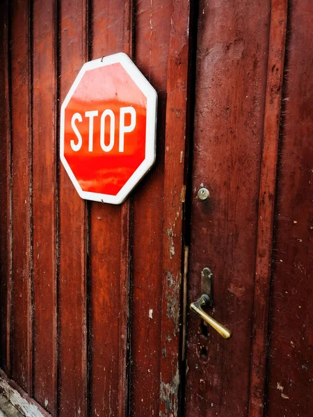 Stop Sign Old Worn Wooden Gate Door —  Fotos de Stock