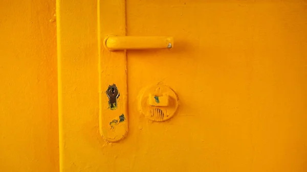 Old Yellow Door Handle Rough Surface Grunge Background — Foto Stock