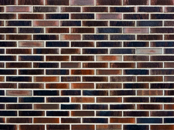 Background texture of a faux brick wall pattern, urban brickwork surface