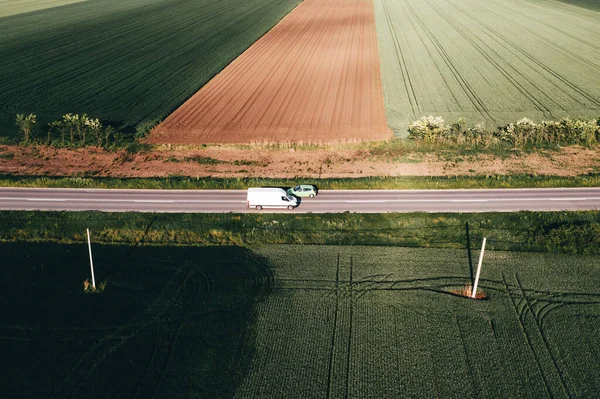 White Van Green Passenger Car Driving Each Other Highway Countryside — ストック写真