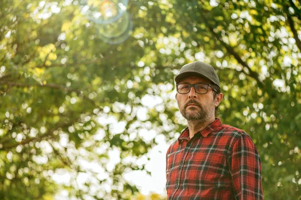 Portrait Male Farmer Wearing Plaid Shirt Trucker Hat Posing Walnut — 스톡 사진