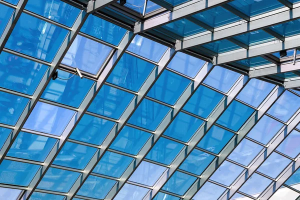 Transparent glass roofing with steel construction, low angle view