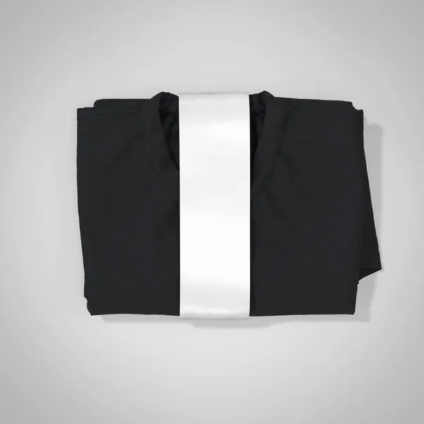 Folded black t-shirt with label, mockup, 3d rendering. High quality 3d illustration