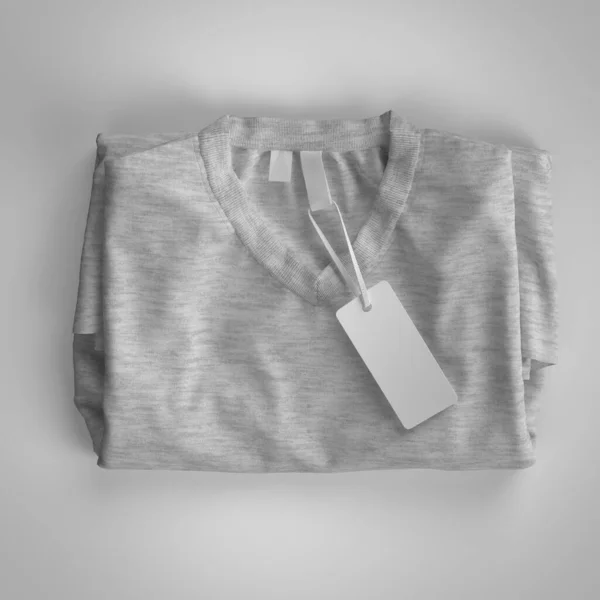 Shirt Dobrada Cinzenta Com Etiquetas Renderização Mockup Fundo Cinzento — Fotografia de Stock