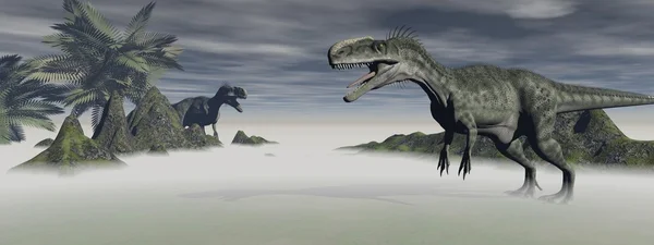 2 つのモノロフォサウルスの恐竜 ロイヤリティフリーのストック写真