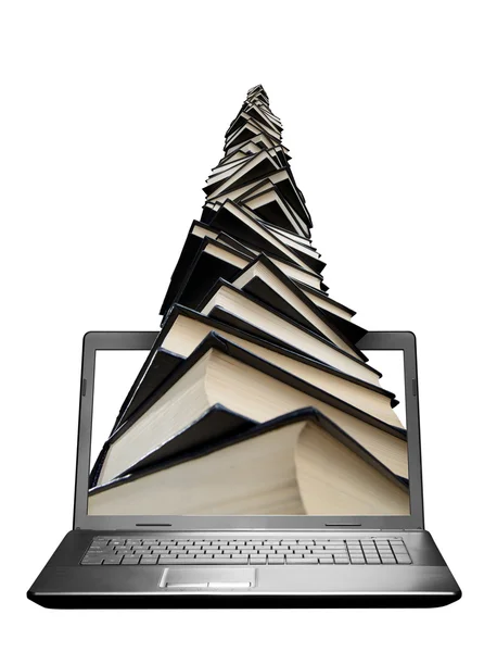 Stapel boeken in laptop — Stockfoto