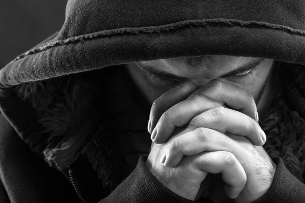 Modląc się bandyta — Zdjęcie stockowe