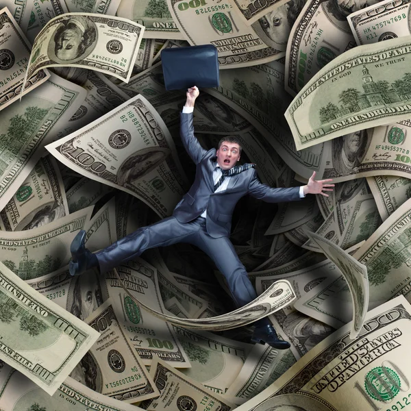 Businessman falling into financial tunnel — Stock Photo, Image