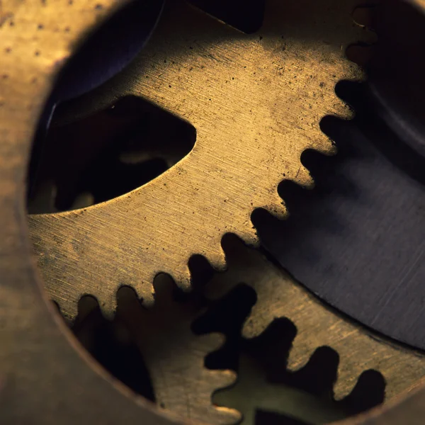 Closeup of gears inside old clock mechanism — Stock Photo, Image