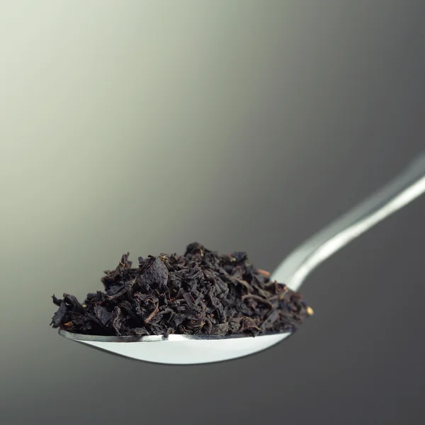 Colher cheia de chá — Fotografia de Stock