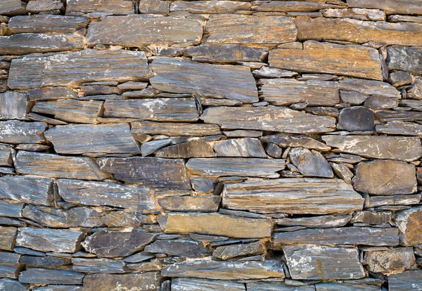 Gestapelde stenen muur — Stockfoto