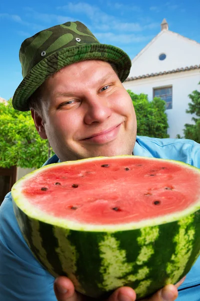 Cheerful farmer with watermelon — Stock Photo, Image