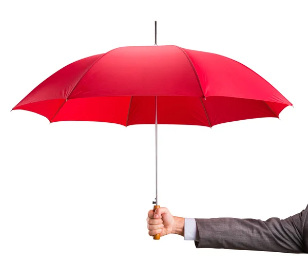 Mão com um guarda-chuva vermelho — Fotografia de Stock