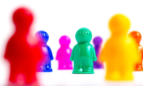 Crowd of colorful toy people — Stock Photo, Image