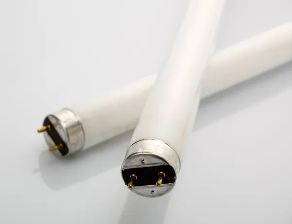 Fluorescent lamp on white — Stock Photo, Image