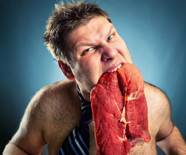 Uomo d'affari pazzo con carne — Foto Stock