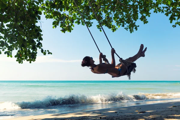 Female on swings — Stock Photo, Image