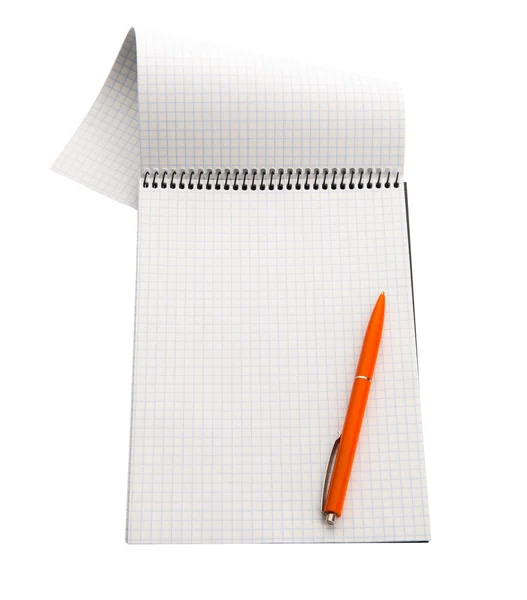 Paper notebook with orange pen — Stock Photo, Image