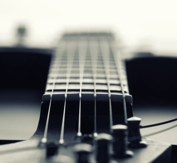 Closeup of electric guitar fretboard with strings Royalty Free Stock Images