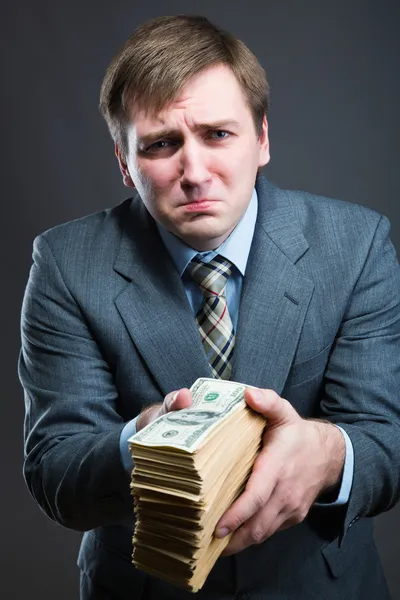 Man with pack of money — Stock Photo, Image