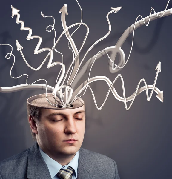 Businessman with arrows in his brain — Stock Photo, Image