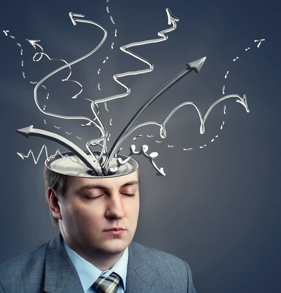 Businessman with arrows inside his head Royalty Free Stock Images