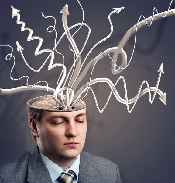 Businessman with arrows in his brain Royalty Free Stock Images