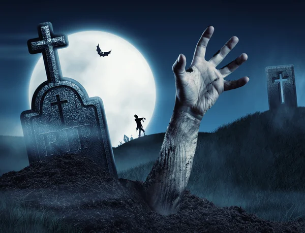 Zombie hand coming out of his grave — Stock Photo, Image