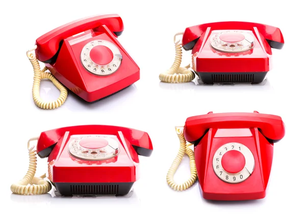 Red telephones on white — Stock Photo, Image