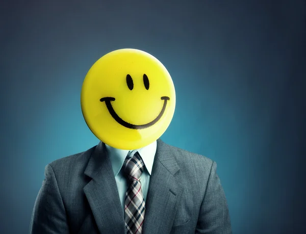 Businessman with smiley face instead of head — Stock Photo, Image