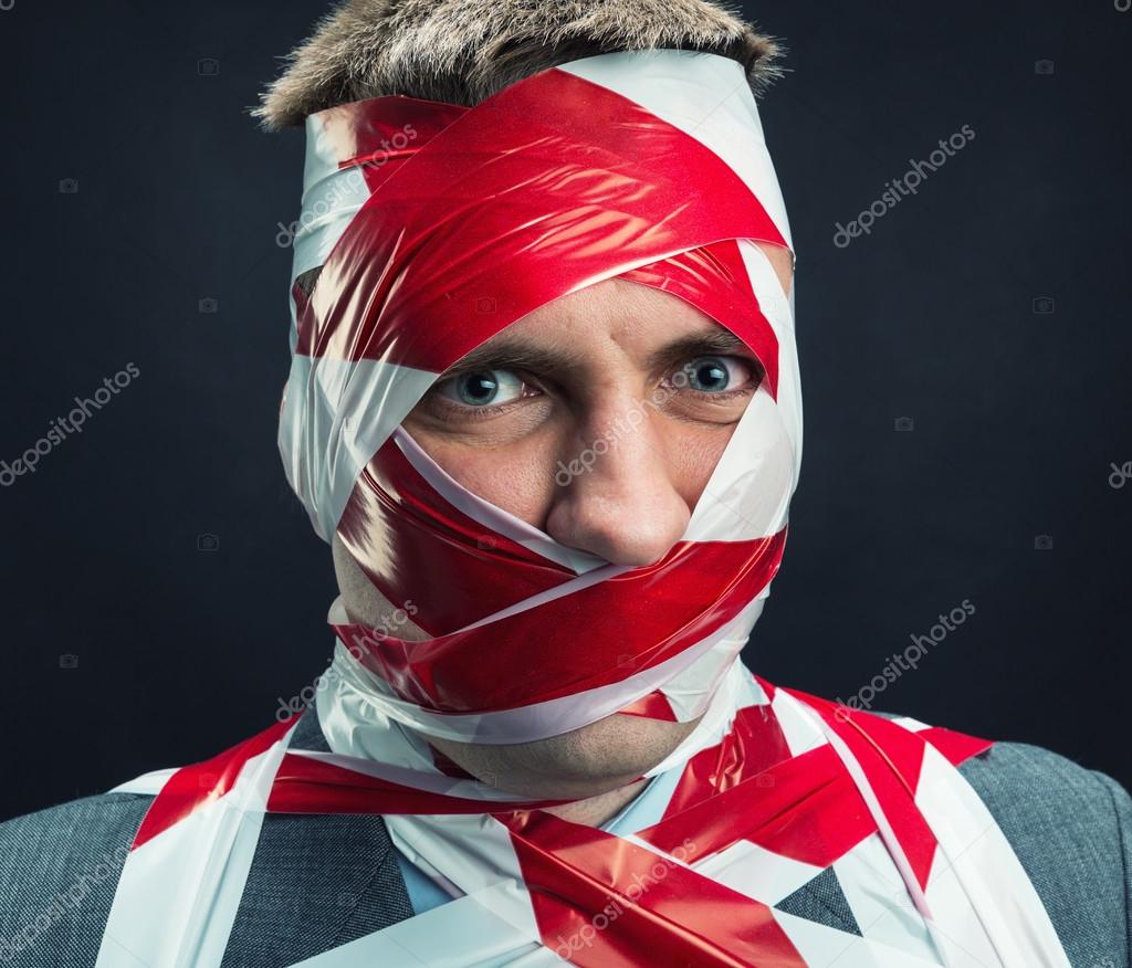 Man with stripped duct tape over body — Stock Photo © Nomadsoul1 47022031
