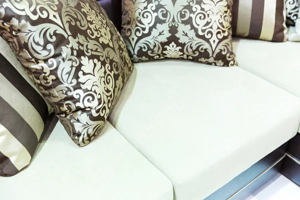 Velvet pillows on the brown sofa — Stock Photo, Image