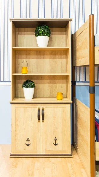 Beautiful wooden cupboard in children 's room — стоковое фото