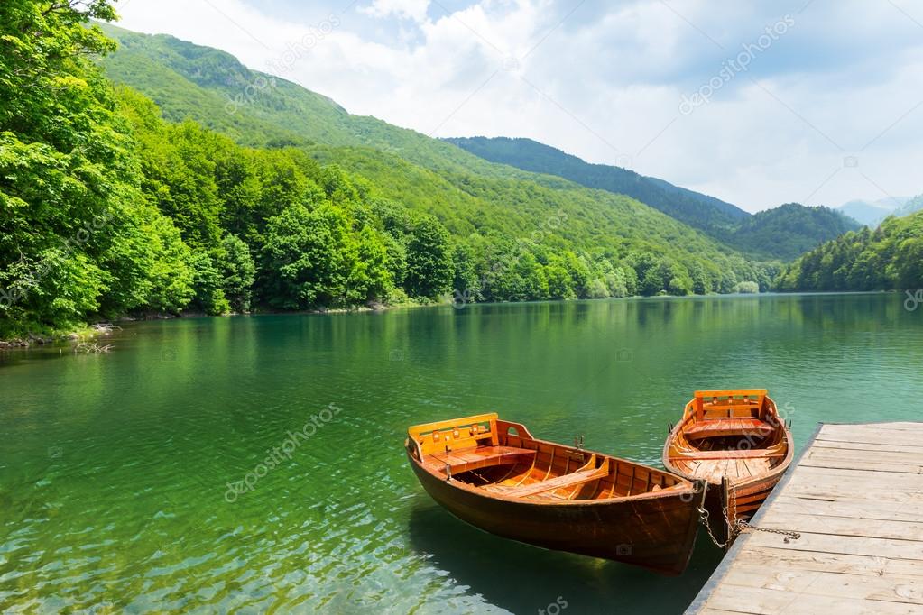 Wooden boats on lake