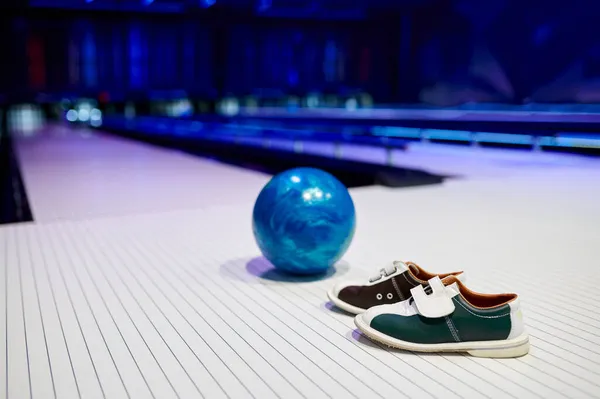 Ball and house shoes, bowling, game concept — Stock Photo, Image