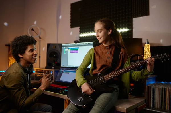 Music Producer Teenager Girl Guitarist Mixing Console Creating Hit Song — Stock Photo, Image