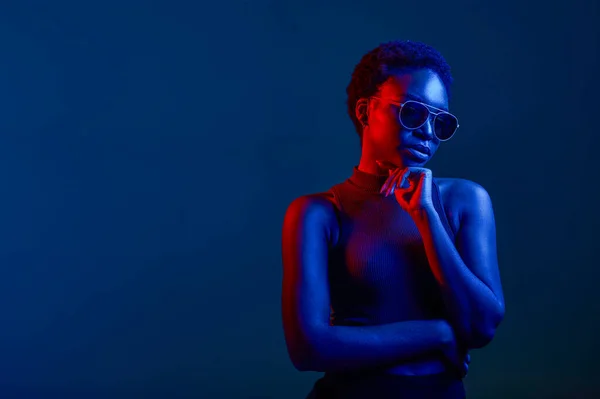Pensive Woman Sunglasses Dark Studio Background Copy Space Neon Light — Stock Photo, Image