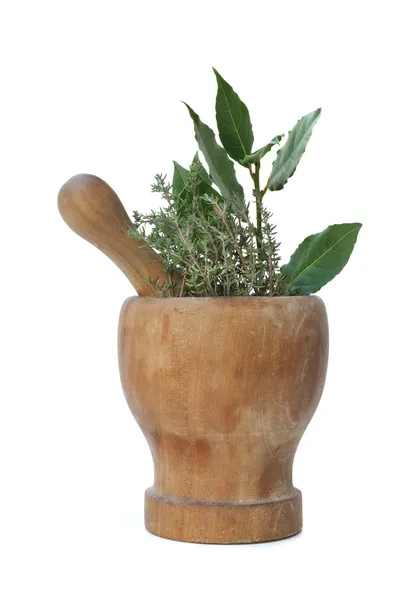 Bay leaves and thyme in a pestle — Stock Photo, Image