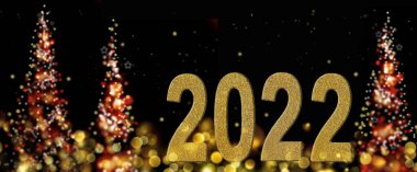 Soyut bir gecede 2022 yılbaşı ve panoramik boyutlarda noel ağaçları