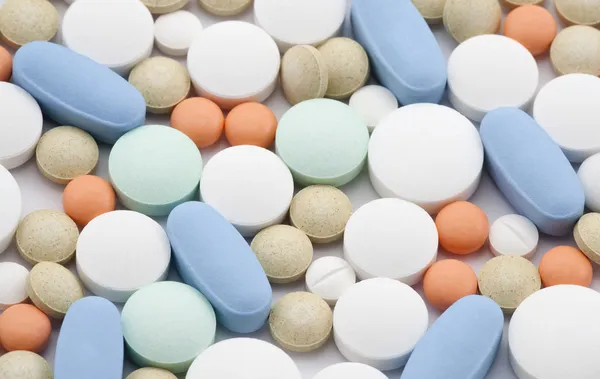 Macro tiro de pílulas coloridas — Fotografia de Stock