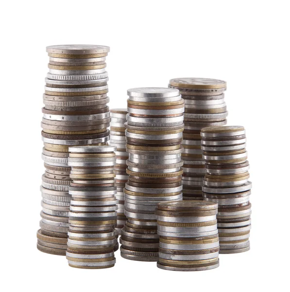 Pilhas de várias moedas com caminho de recorte — Fotografia de Stock