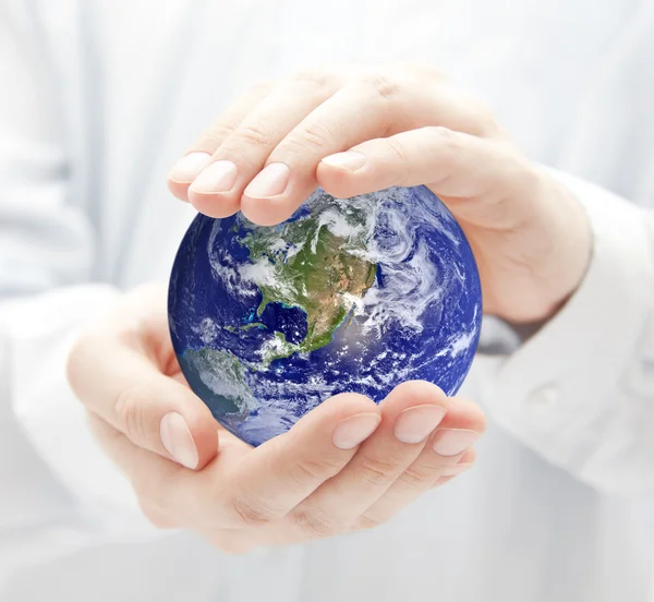 Globe in hands — Stock Photo, Image