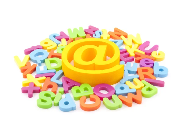 Email symbol and colorful letters on white background — Stock Photo, Image