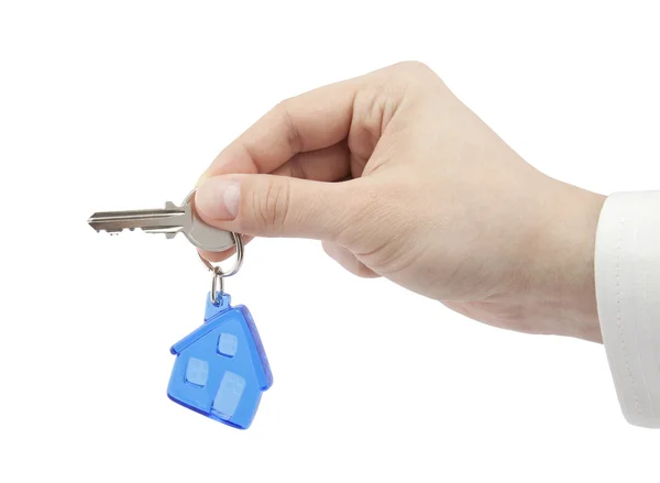 House key in hand with clipping path — Stock Photo, Image