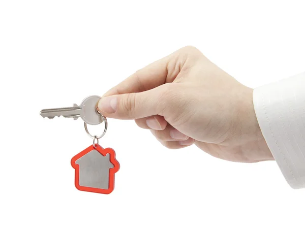 House key in hand with clipping path — Stock Photo, Image