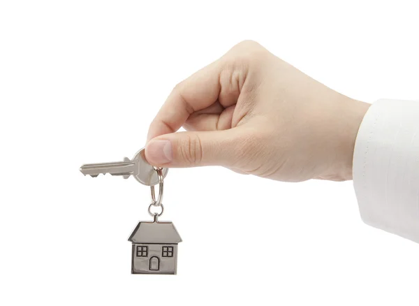 House key in hand with clipping path — Stock Photo, Image